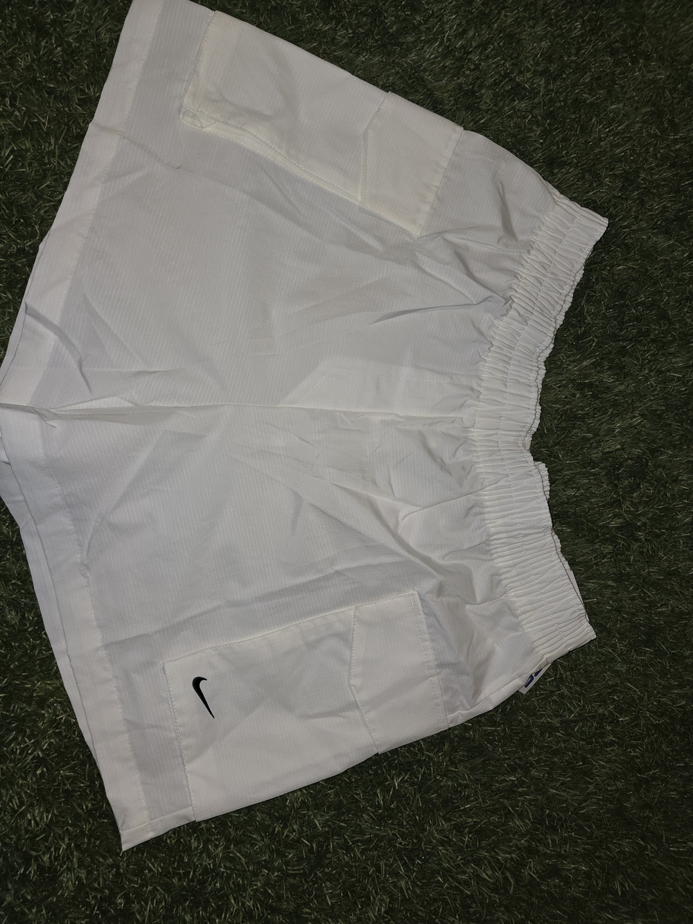Nike White Athletic Shorts with Pocket and Swoosh